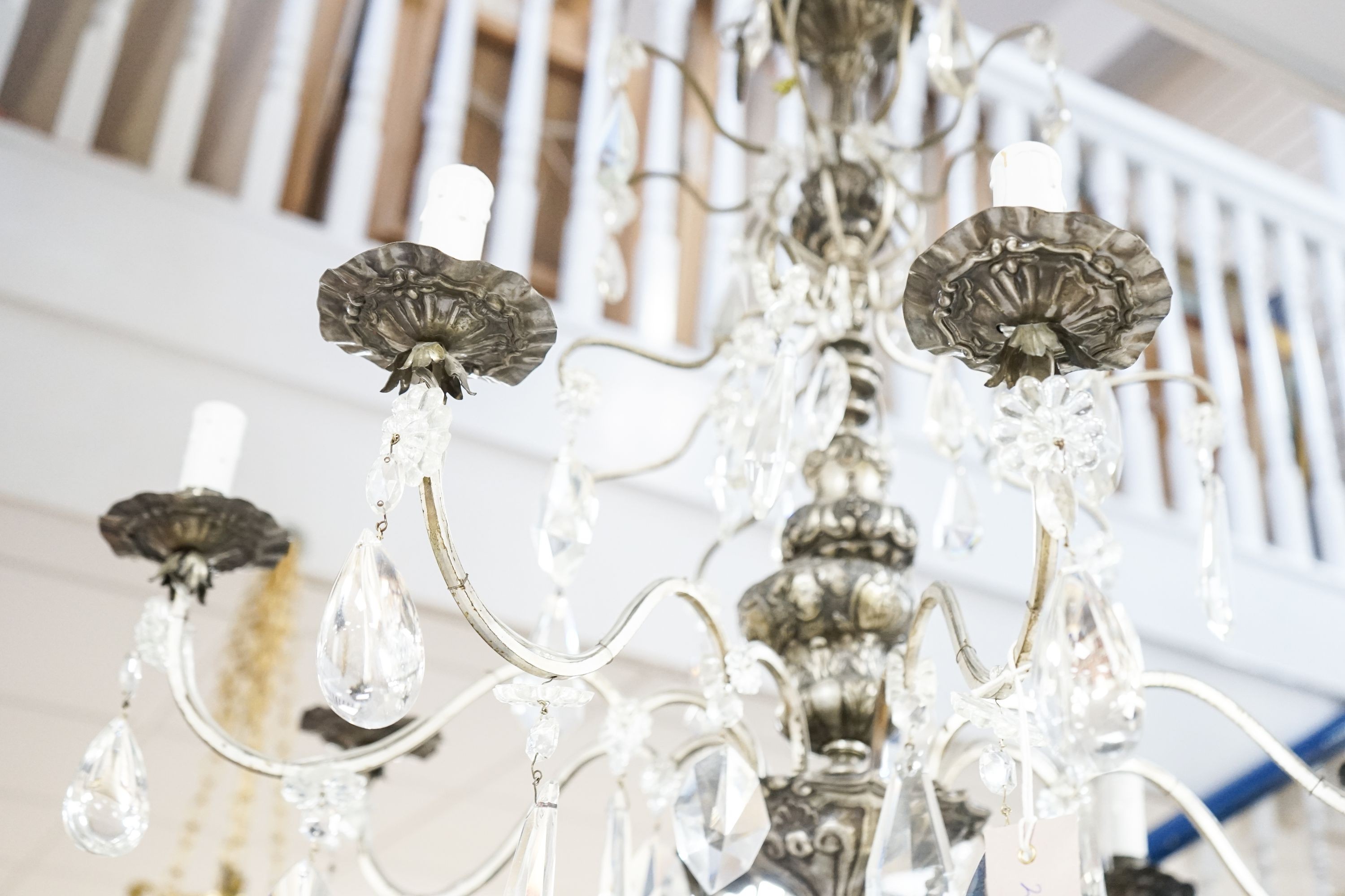A silvered and crystal eight branch chandelier, approx. height 79cm